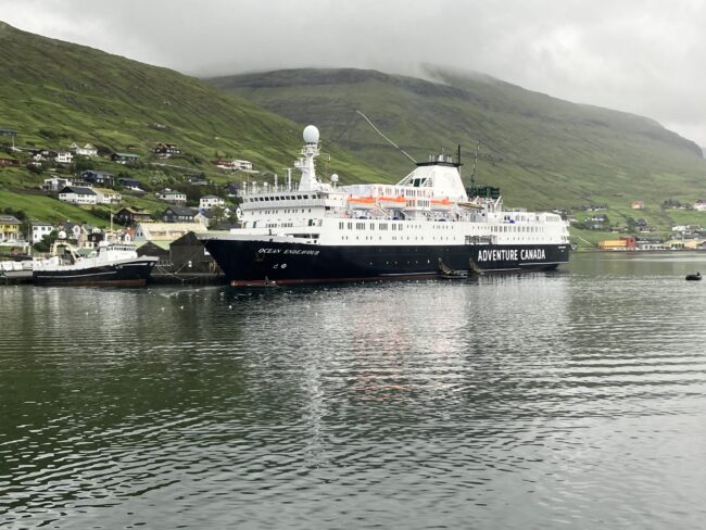 Picture of a cruise ship docking at the port of Vestmanna